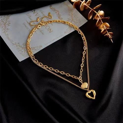 Collier en acier titane avec ailes d'ange et pendentif en forme de cœur pour femme, accessoire de fête, bijou tendance de haute qualité, idéal comme cadeau