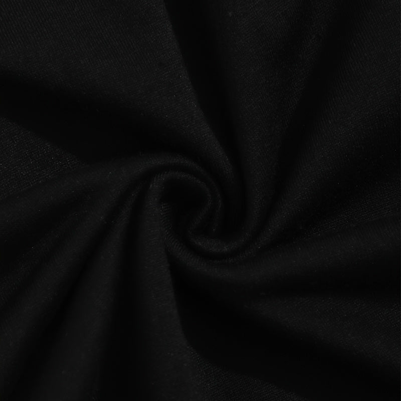 Black fabric close-up of women's solid 2-piece set material