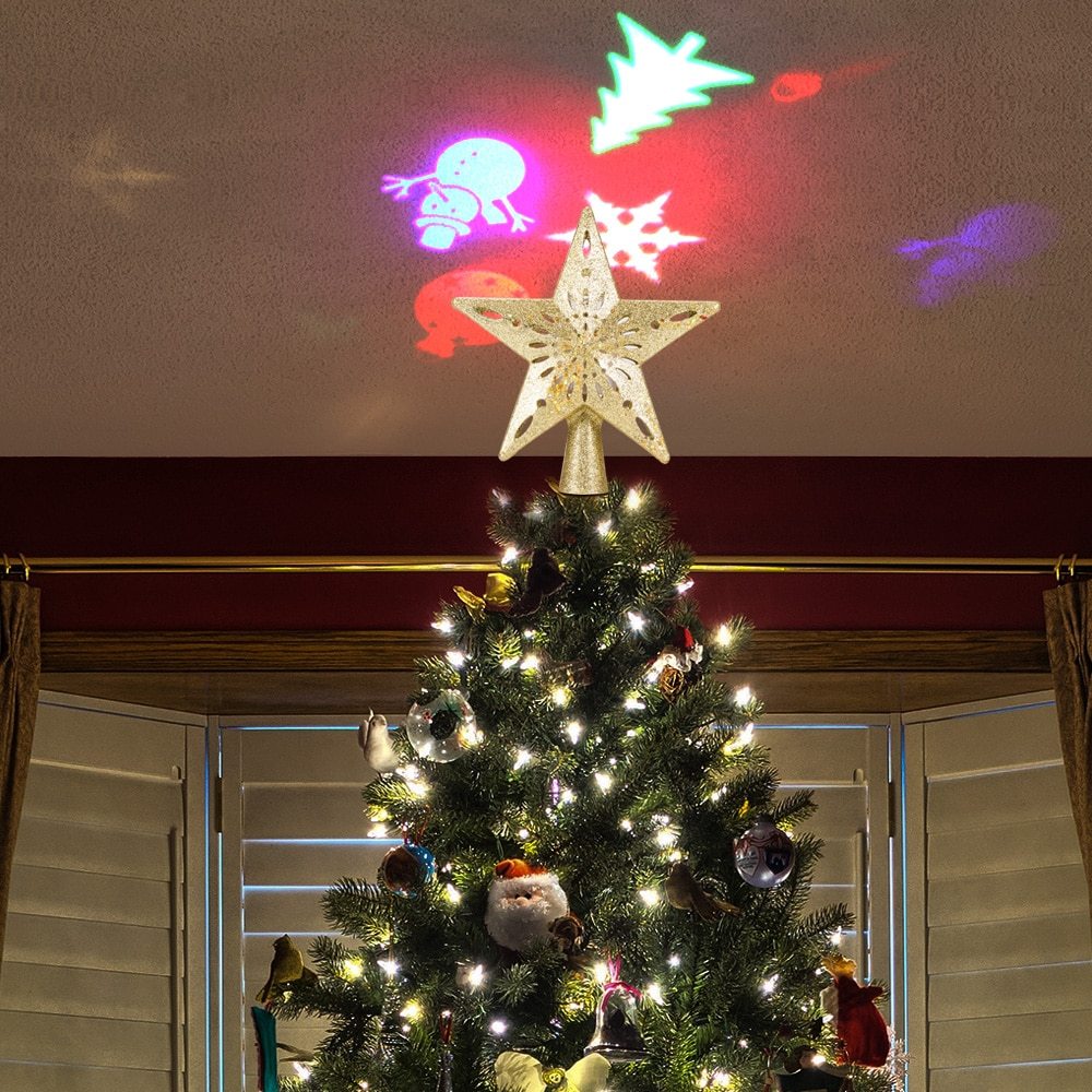Christmas tree top light star-shaped LED projector displaying colorful Christmas-themed patterns on ceiling