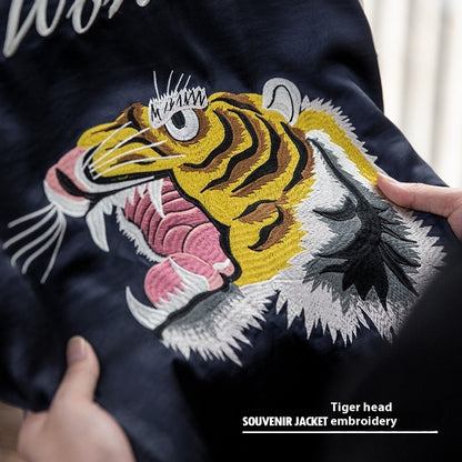Close-up of embroidered tiger head design on retro two-sided wear Yokosuka coat for men
